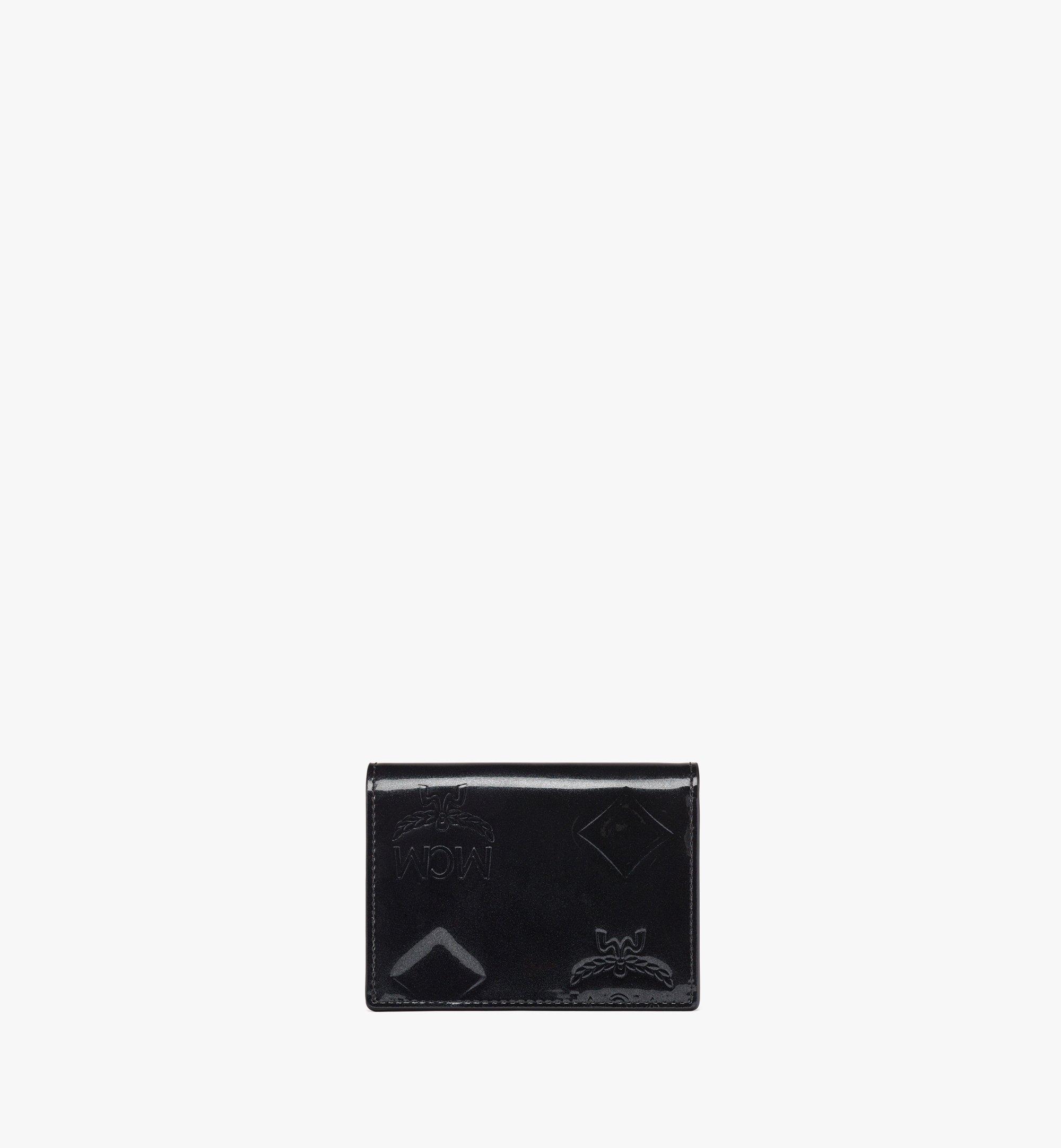 MCM Aren gefaltetes Portemonnaie aus Lackleder mit Schnappverschluss und Maxi-Monogramm Black MYSDATA02BK001 Noch mehr sehen 2