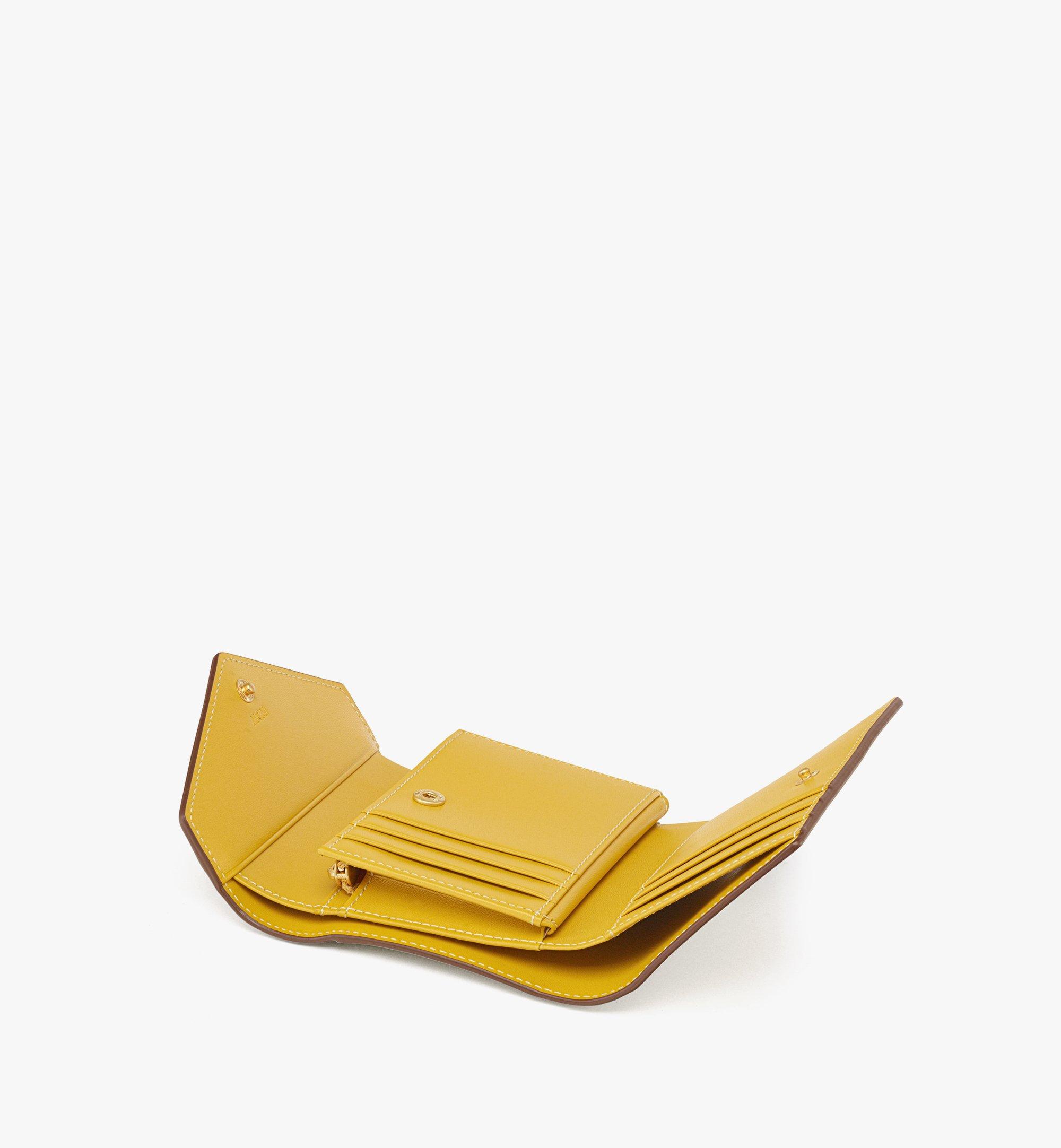 MCM Himmel 三つ折りウォレット - ローレトス Yellow MYSEAAC01Y9001 ほかの角度から見る 1