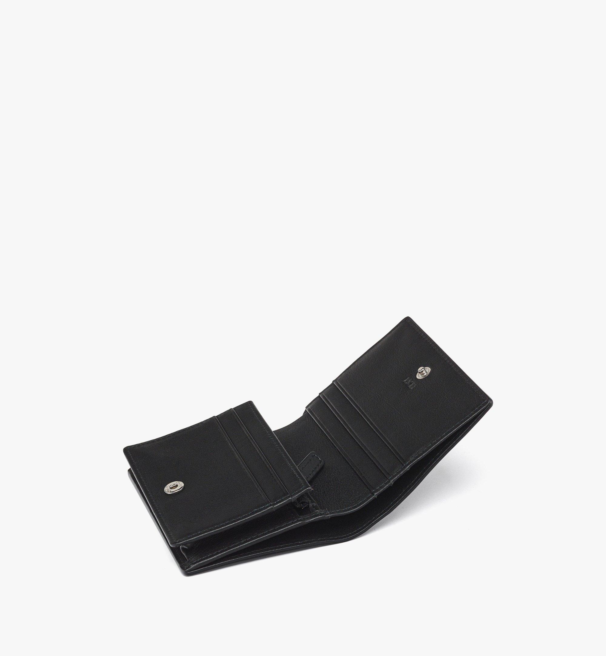 MCM Aren Portemonnaie aus geprägtem Leder mit Monogramm und Schnappverschluss Black MYSESTA01BK001 Noch mehr sehen 1