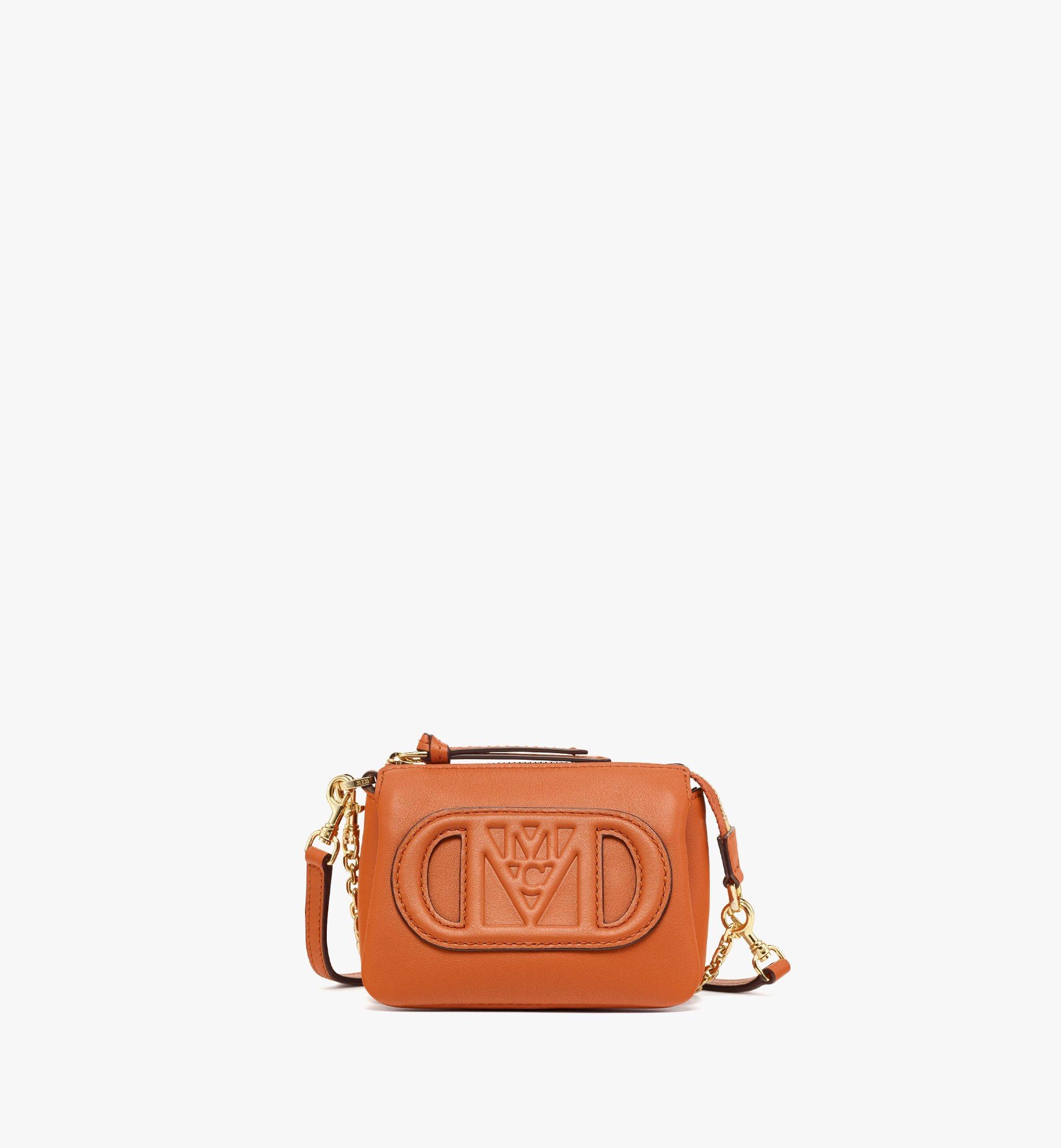MCM - Your day-to-night choice, the Essential Multifunction Crossbody Pouch  in Visetos. #MCMGREECE #MCMSS21
